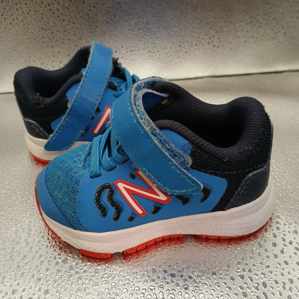 New Balance Kids Blue and Red Shoes
